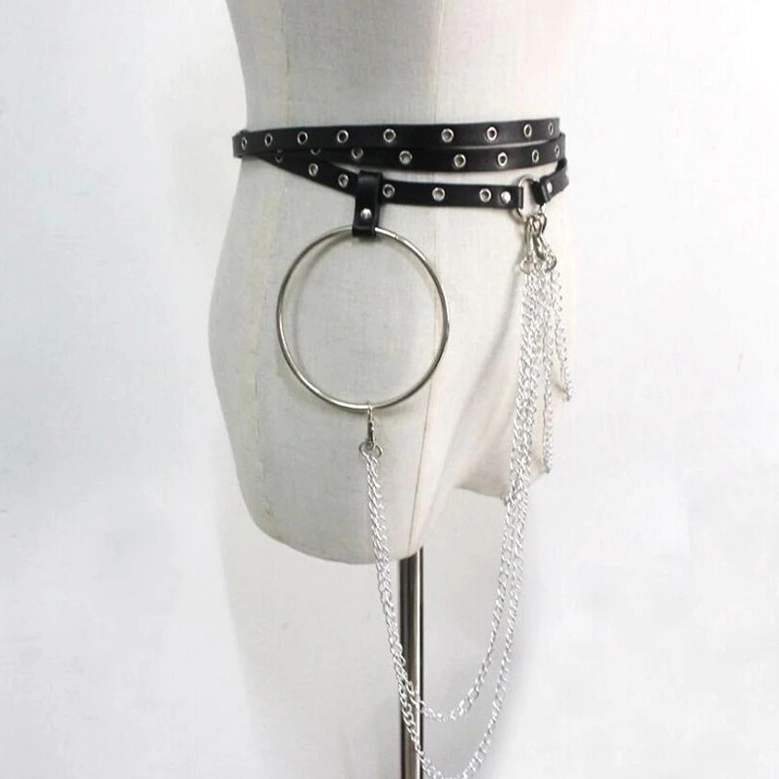 Black gothic chain belt side back view on mannequin, featuring long silver chain tassels, sculptural metal hoop, and faux leather strap construction