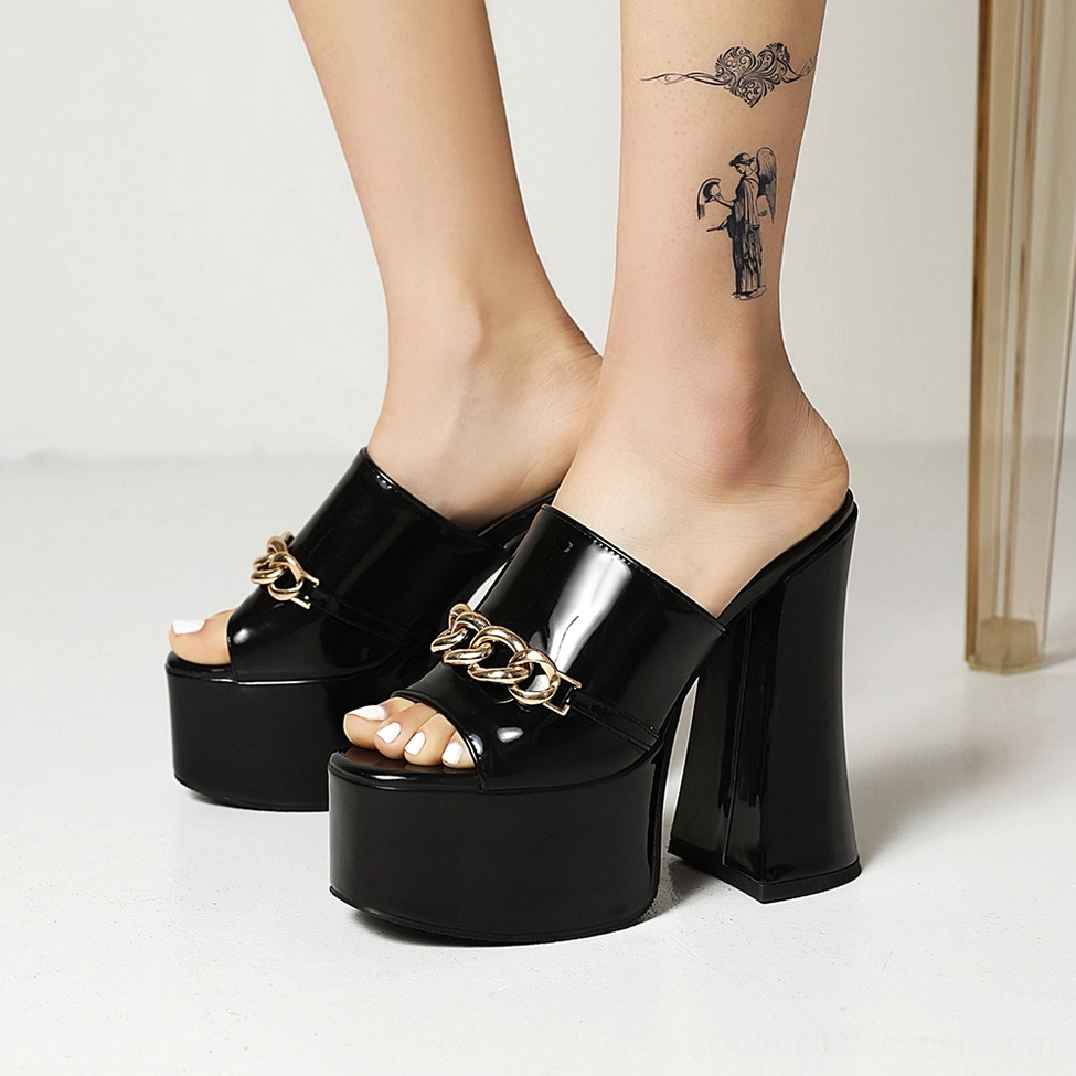 Additional angle of black gothic chain platform heels emphasizing 15cm super high heel construction