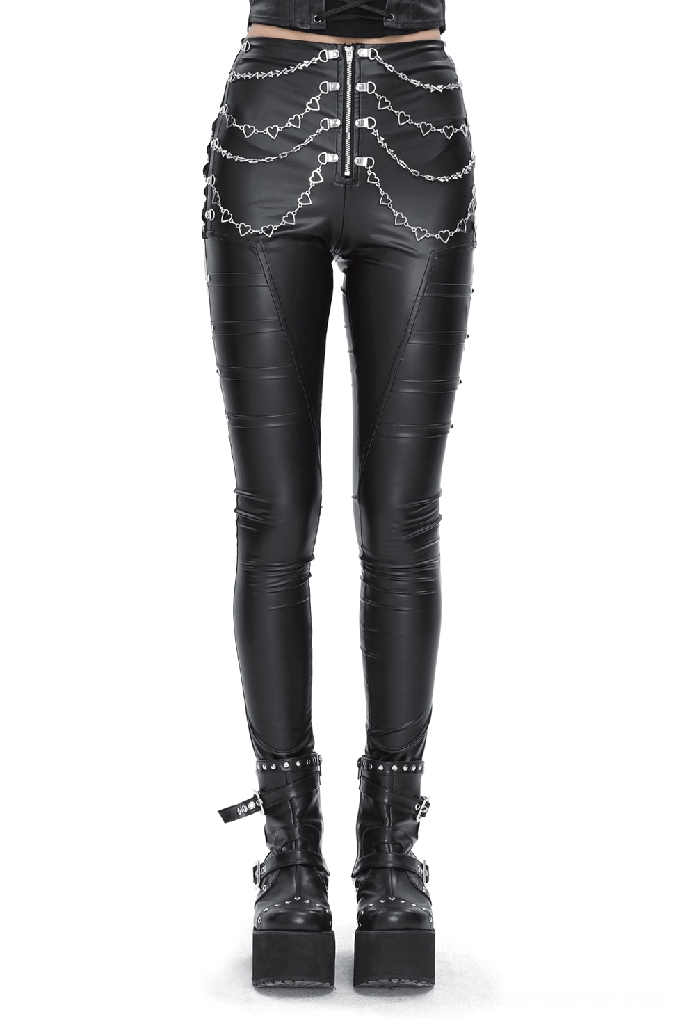 Women's black gothic faux leather skinny pants with heart chain accents, front view on model