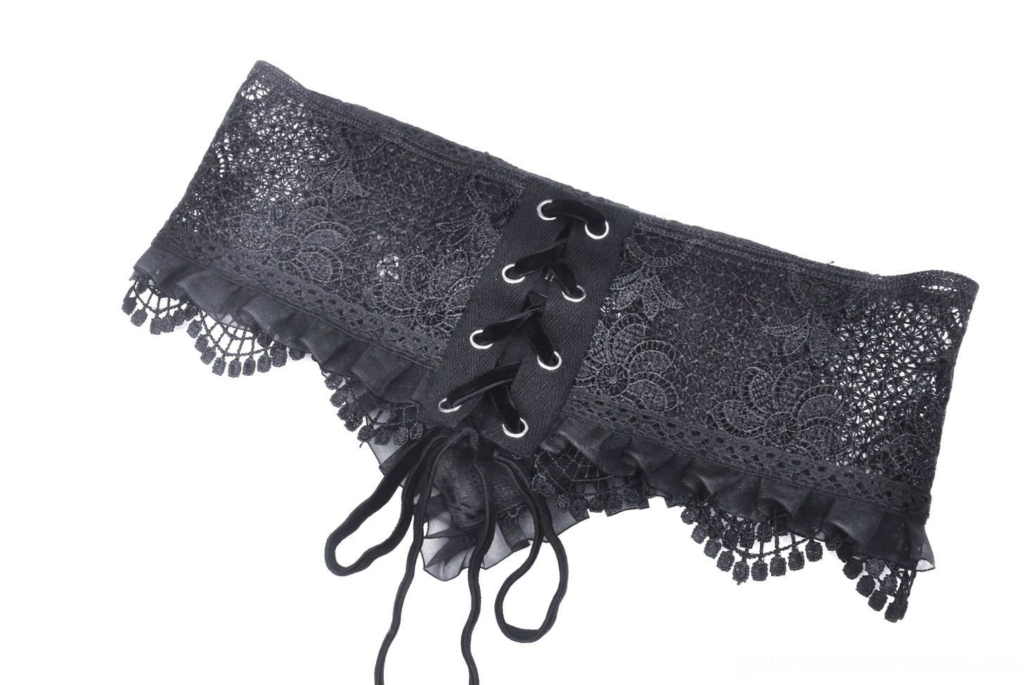 Side profile flat lay of black gothic corset belt with visible ribbon lacing system and tassel-adorned ruffled trim edges
