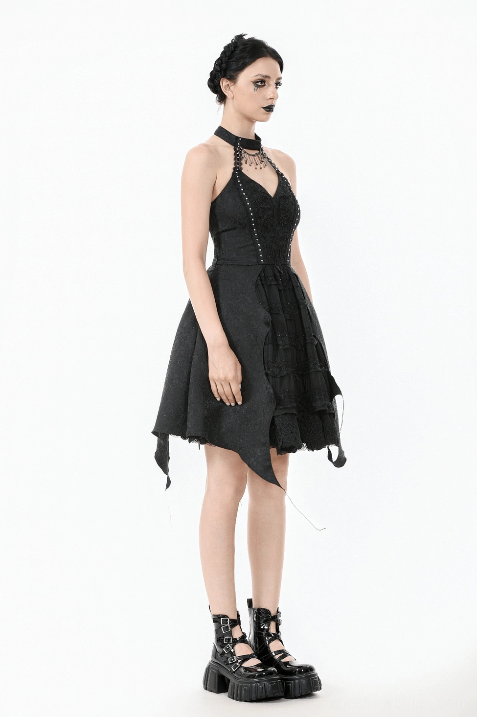 Black gothic halter corset dress showing bodice fit and silhouette shaping from front angle