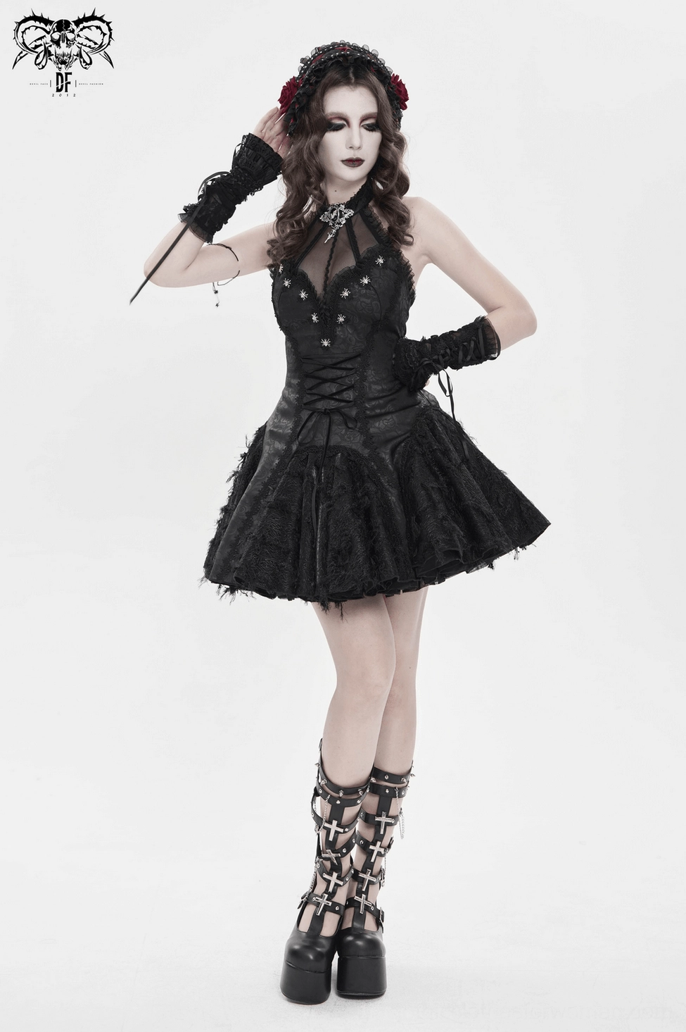 Black gothic corset dress with mesh choker and sheer panels subcultural fashion styling