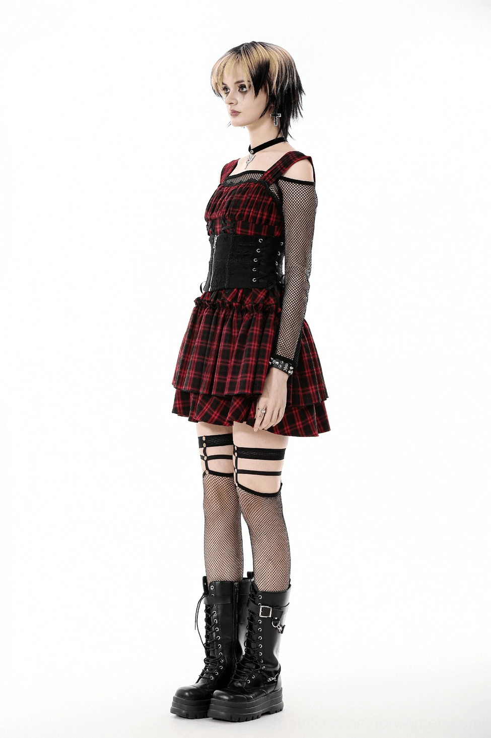 Black gothic corset detail showing metal hardware and ribbon fastening system