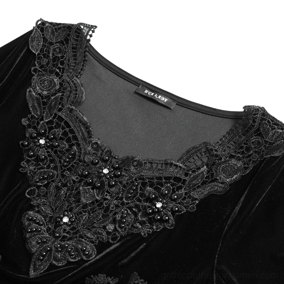 Close-up of beaded Victorian lace neckline detail on black velvet gothic top