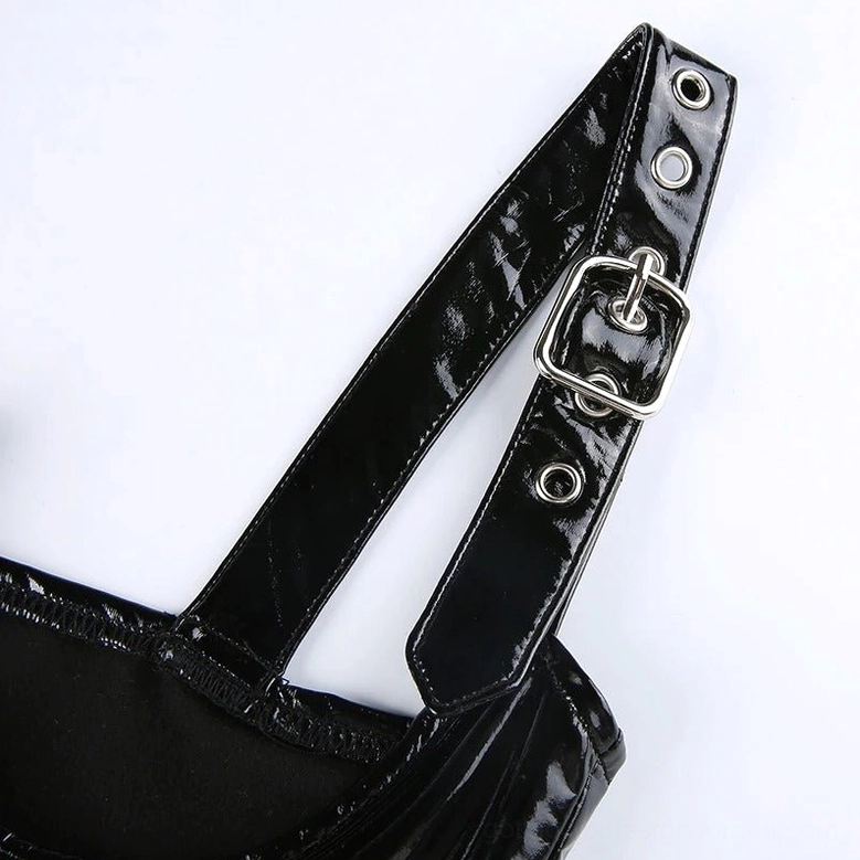 Black PU leather gothic bustier crop top construction detail, highlighting stitching and polished silver hardware elements