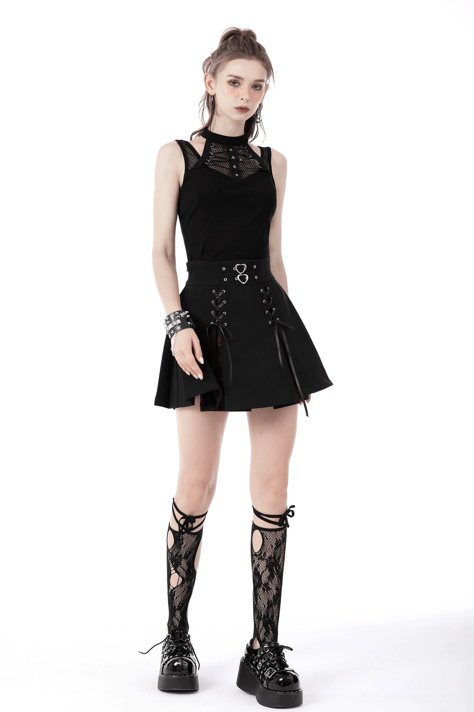 Black gothic crop top side profile view showing lace-up mesh and back ribcage cutout design