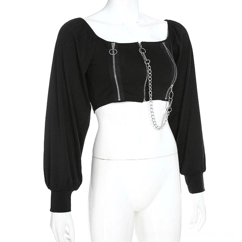 Black gothic crop top front-side view displaying cropped length and sleeve construction