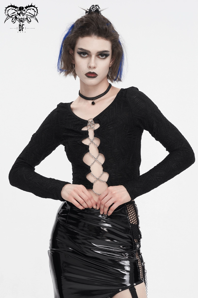 Black gothic chain lace-up crop top styled with patent leather skirt and alternative fashion accessories