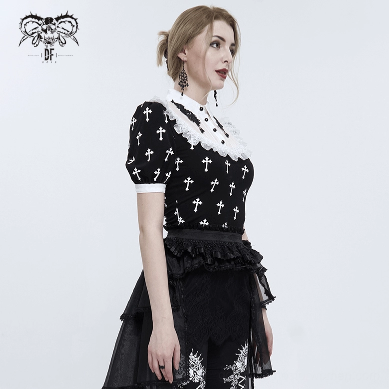 Side three-quarter view model wearing black gothic cross blouse with high-low black ruffled skirt