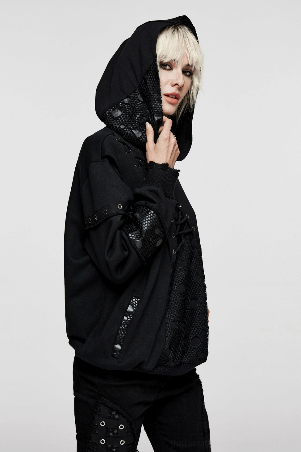 Additional angle of black gothic hoodie displaying cross print design and alternative fashion styling