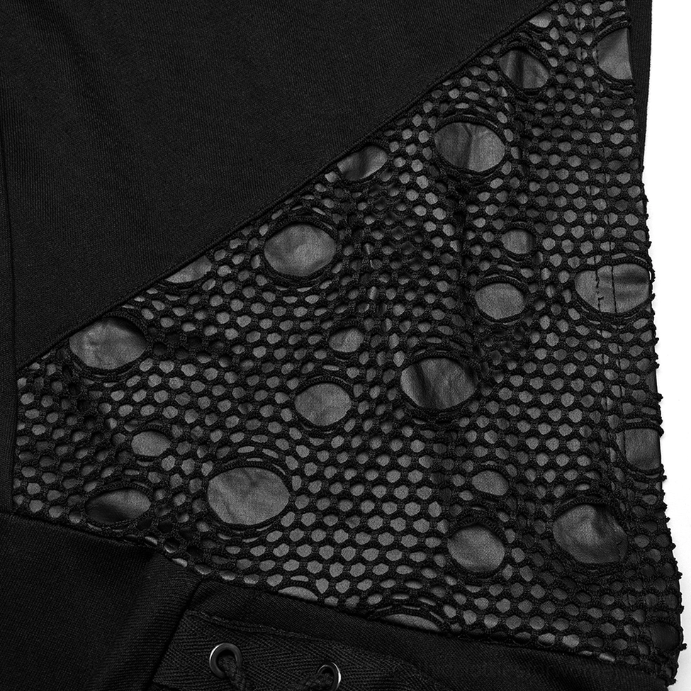 Detail close-up of mesh panel and metal lace-up eyelets on black gothic hoodie against dark backdrop