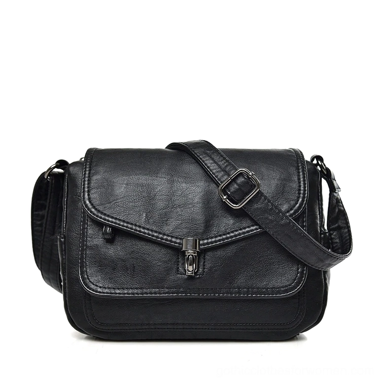 Black gothic flap crossbody handbag with twist-lock closure, soft leather shoulder bag front view