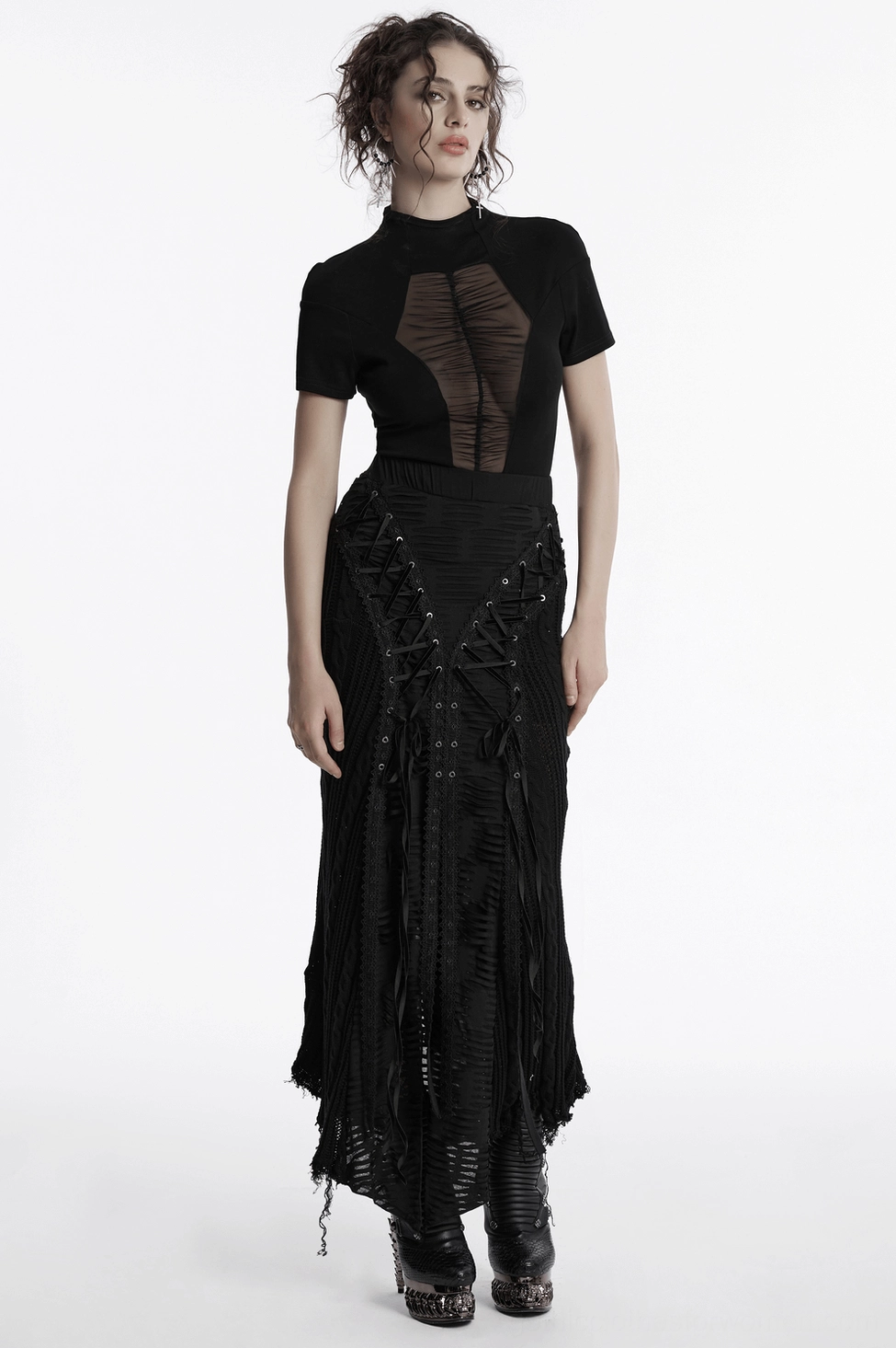 Black gothic lace-up knit maxi skirt product shot emphasizing distressed panel details and dark aesthetic