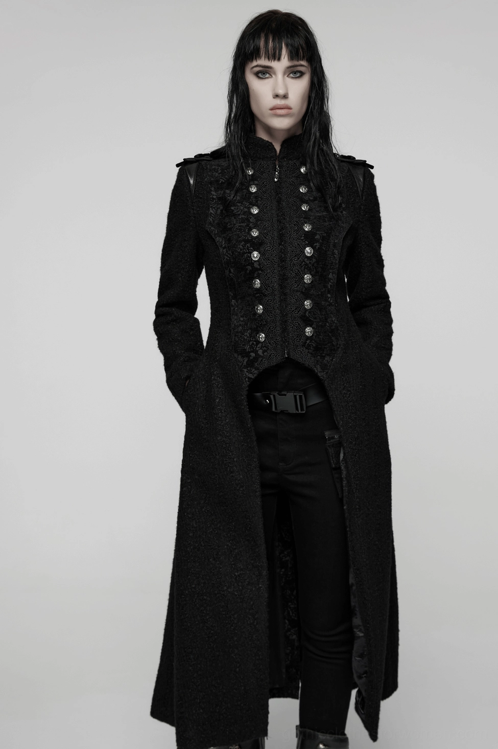 Black gothic double-breasted wool coat full length view demonstrating dramatic A-line hem and floor-length proportions with architectural silhouette