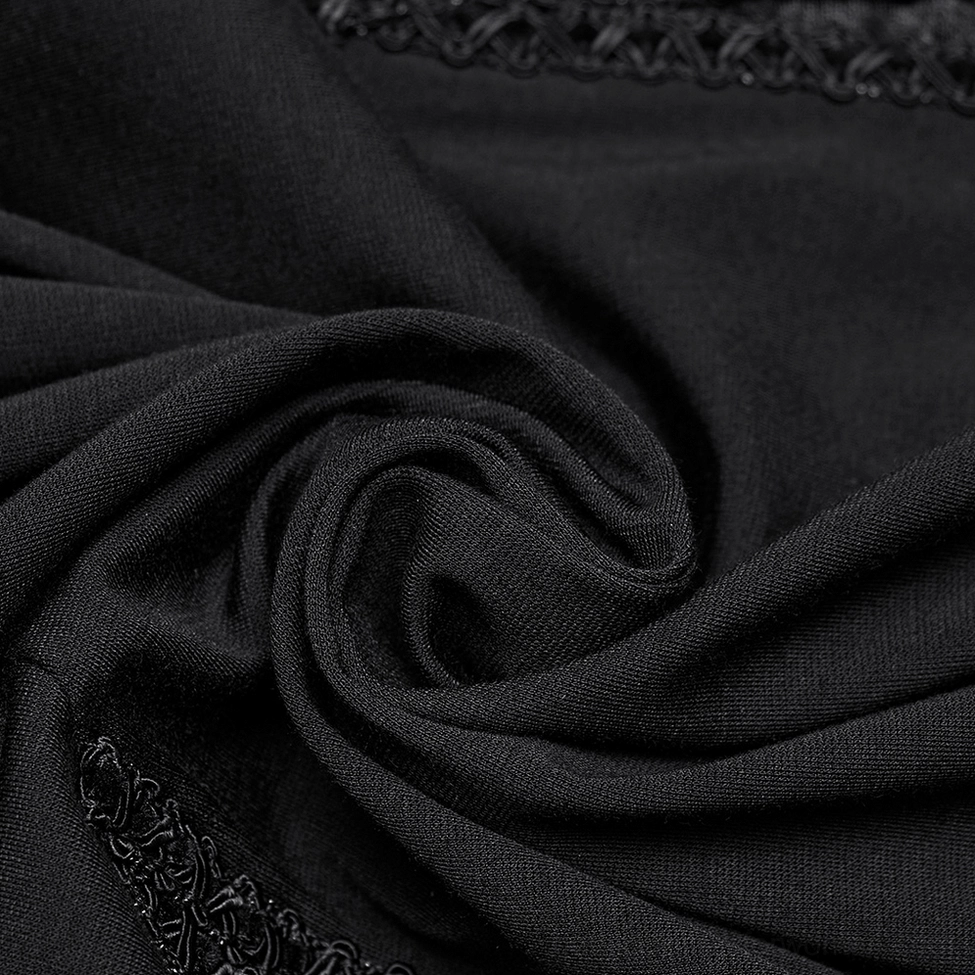 Black gothic maxi dress asymmetric hem detail showing jagged pointed edge and sheer mesh panel construction