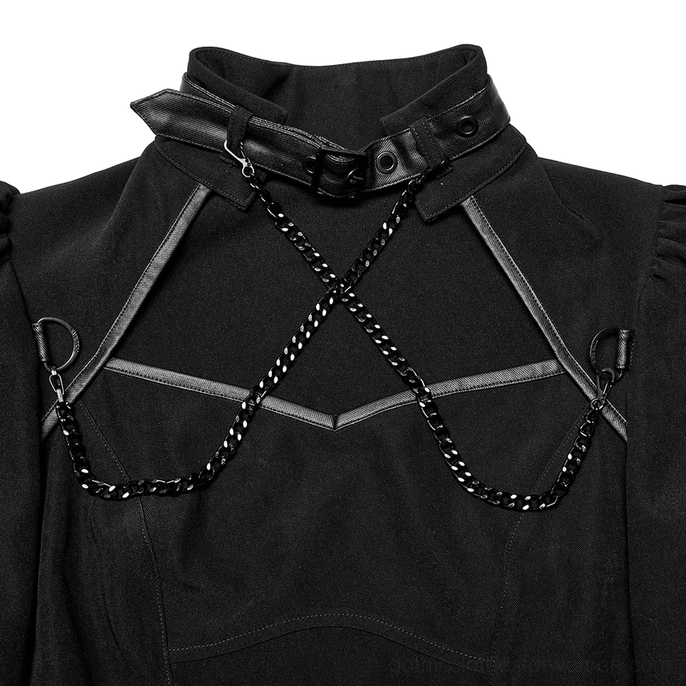 Close-up detail of black gothic dress square neckline with faux leather collar binding and cross body chain harness