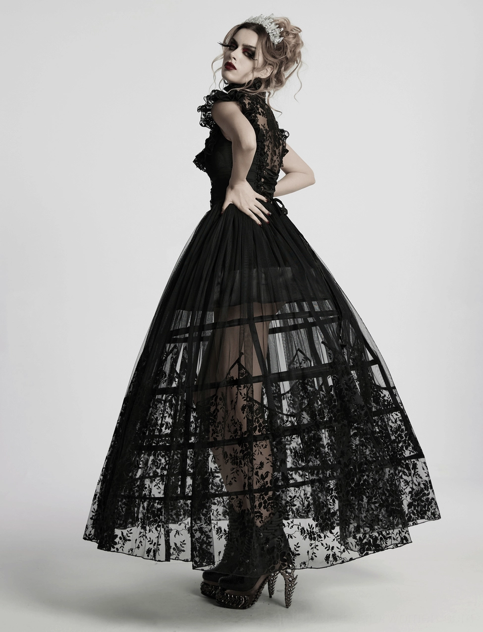 Black gothic dress full length view - complete silhouette showing ruffled sleeves and floor-length lace