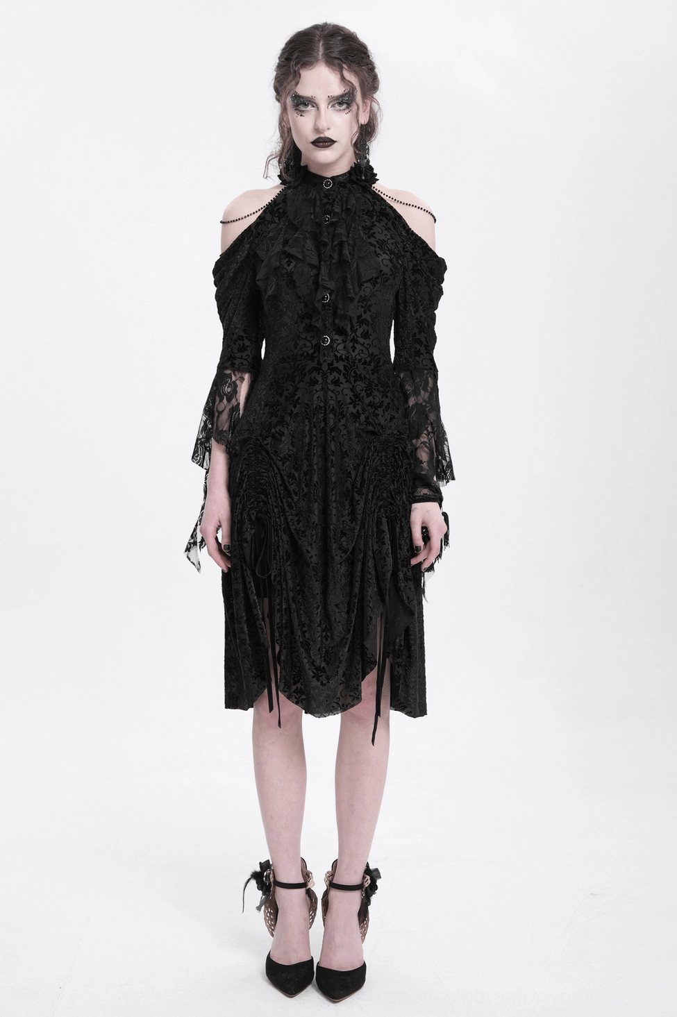 Black gothic dress with lace sleeves and ornamental embellishments, refined alternative fashion