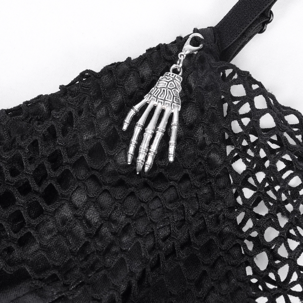 Front view of black gothic asymmetric dress emphasizing the layered skirt with fishnet and lace elements