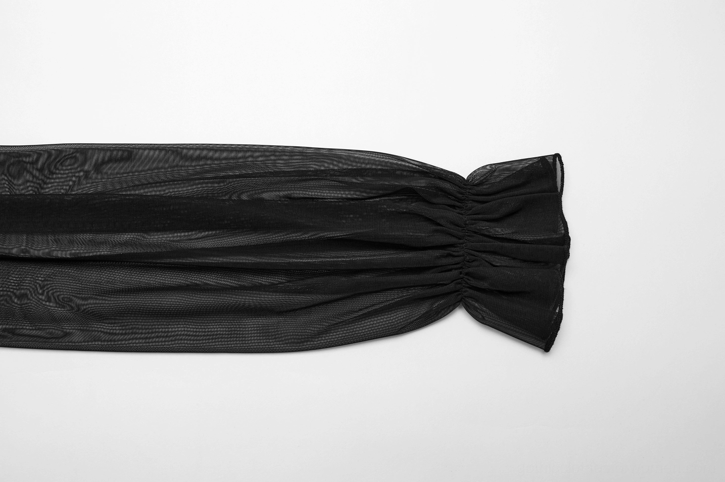 Close-up detail of sheer mesh batwing sleeve cuff with ruffled gathering on black gothic velvet dress
