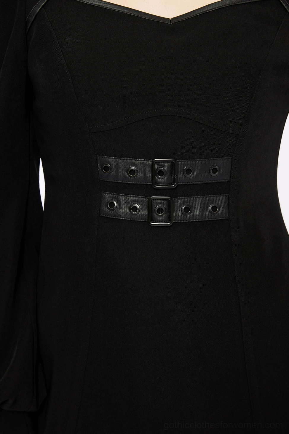 Black gothic techwear dress showing intricate stitching and architectural seaming of neckline and shoulder construction