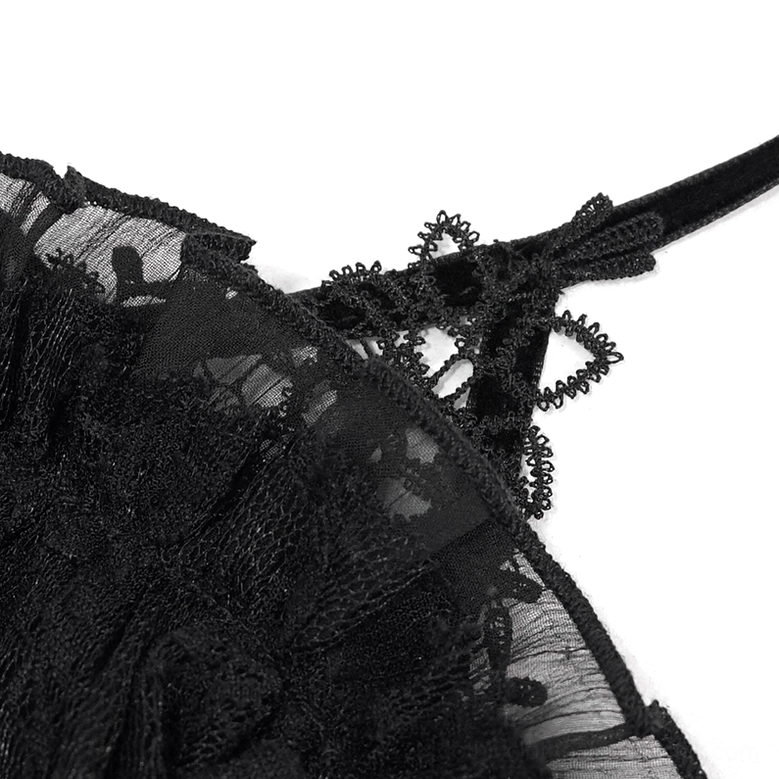 Close-up of black gothic dress strap and neckline with lace trim and mesh detail