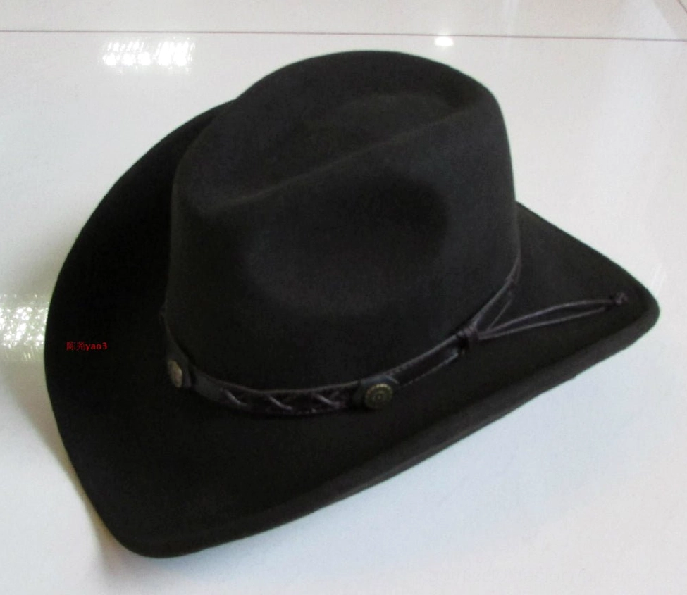 Right three-quarter angle of black gothic wool fedora showing braided leather trim, metal studs, and wide curved brim for dramatic silhouette