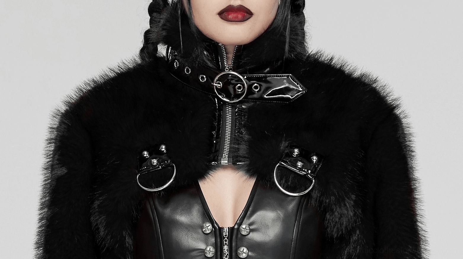 Black faux fur gothic cropped jacket on model demonstrating fit, comfort, and alternative punk-inspired silhouette