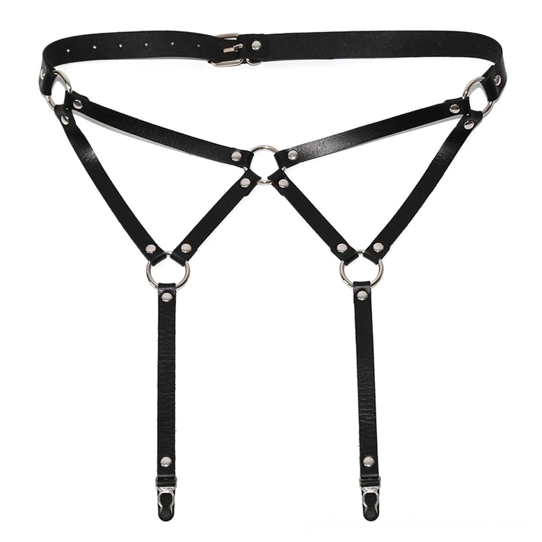 Black gothic garter belt harness flat lay, front view showing geometric strap design with metal clips and triangle detailing