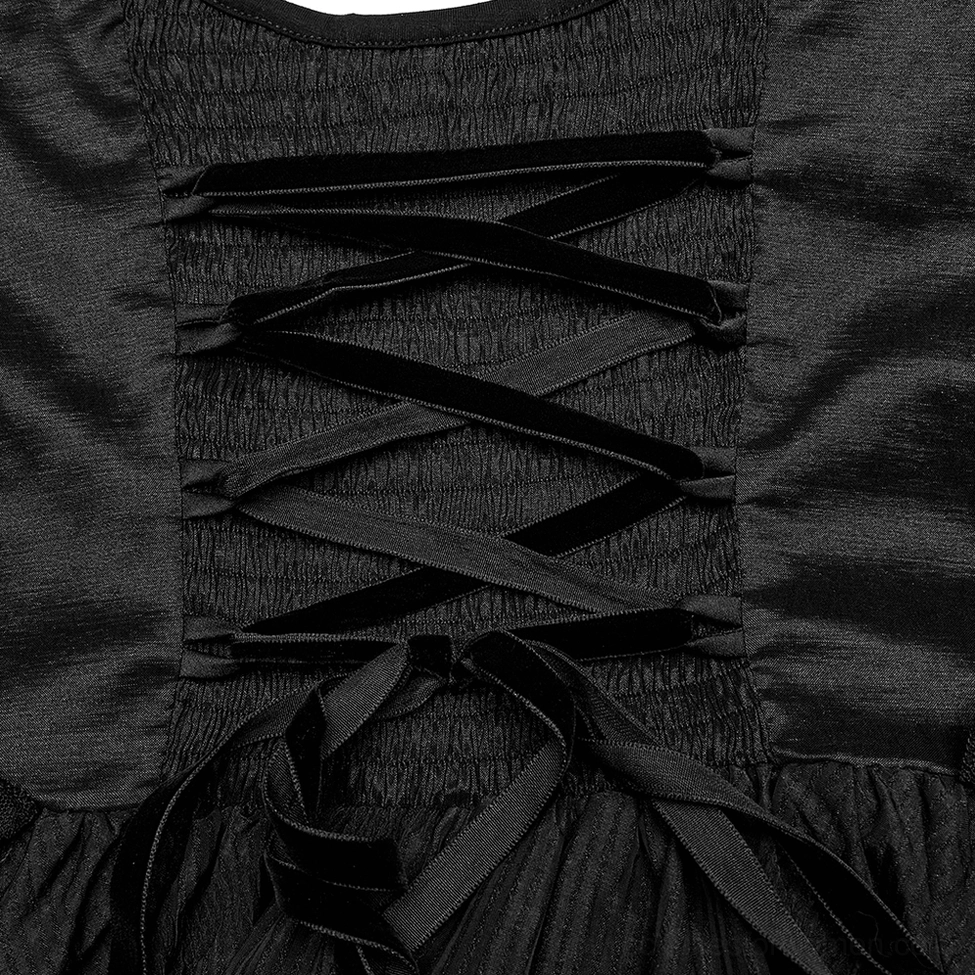 Black Victorian gothic lace evening gown flat lay detail showing embroidered mesh panels and 3D gusset construction