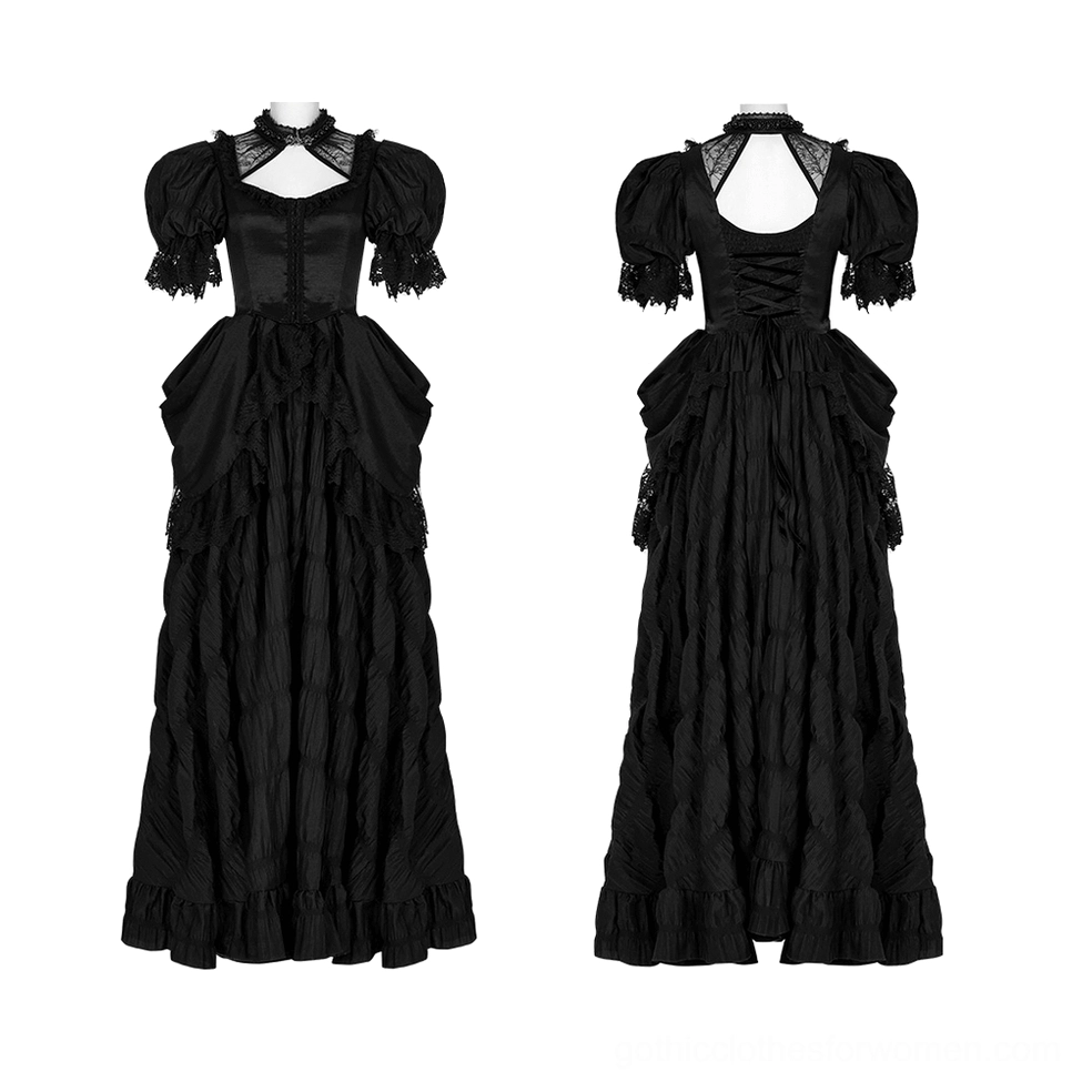 Black gothic evening gown front angled view displaying square neckline cutout and decorative embroidered mesh detail on mannequin