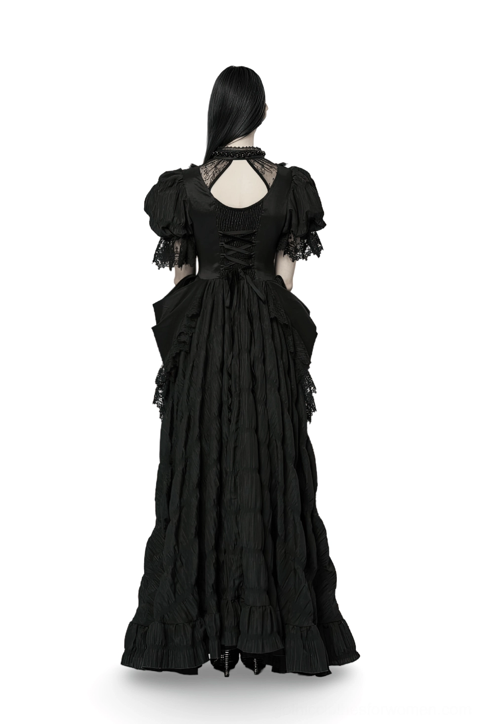 Black gothic evening gown rear view showing dramatic lace-up corset back cutout and layered ruffled skirt on mannequin