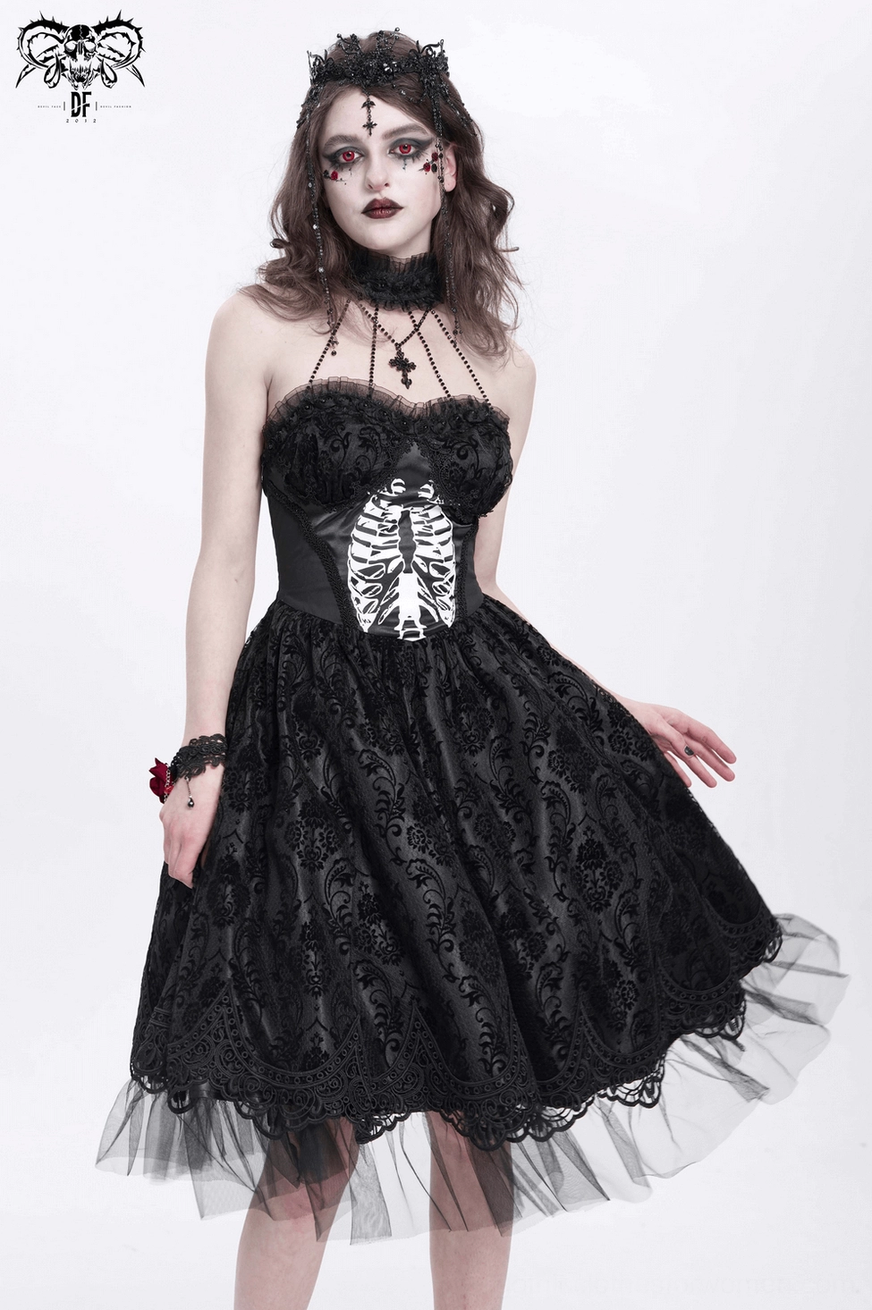 Black gothic halter dress with tulle skirt showing halter strap construction and lace details