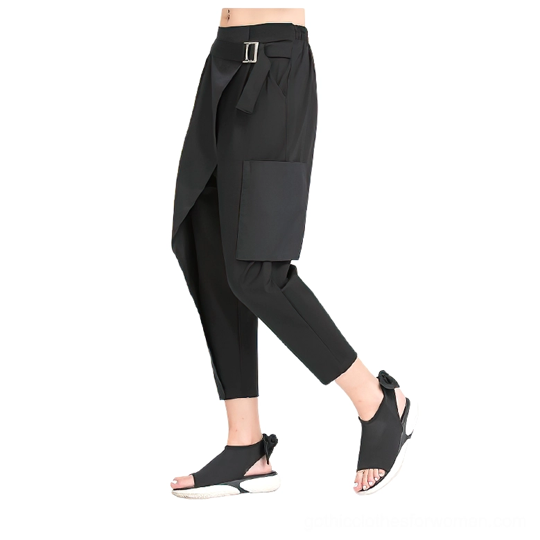 Black gothic harem pants three-quarter side angle showcasing asymmetrical wrap front and large side cargo pocket design