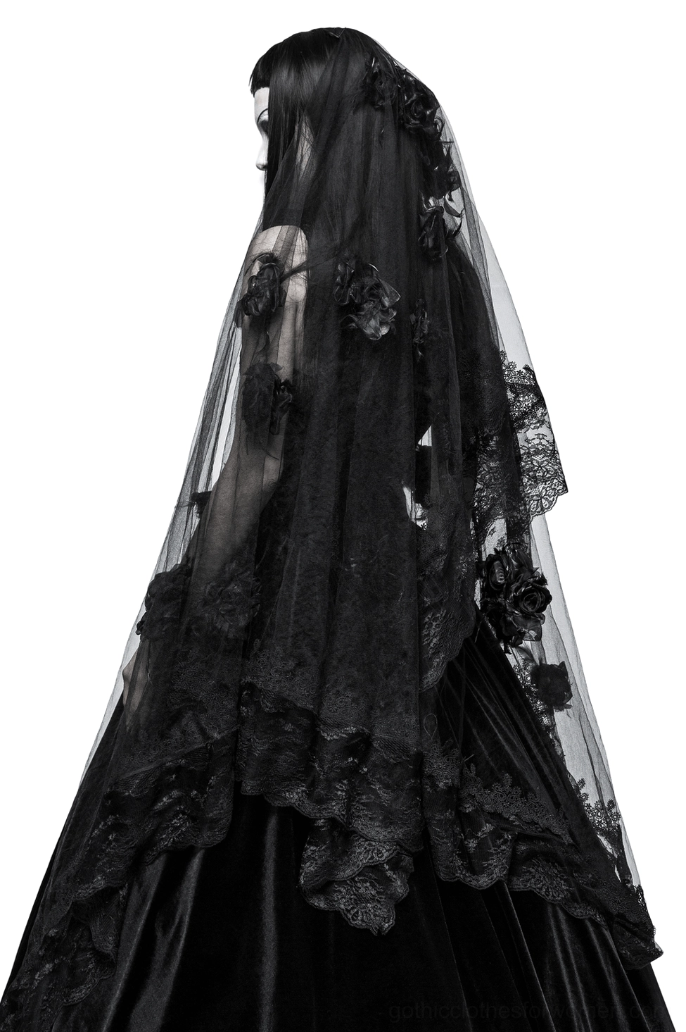 Back view of black gothic bridal veil displaying layered lace edges and floral decorations, worn by model