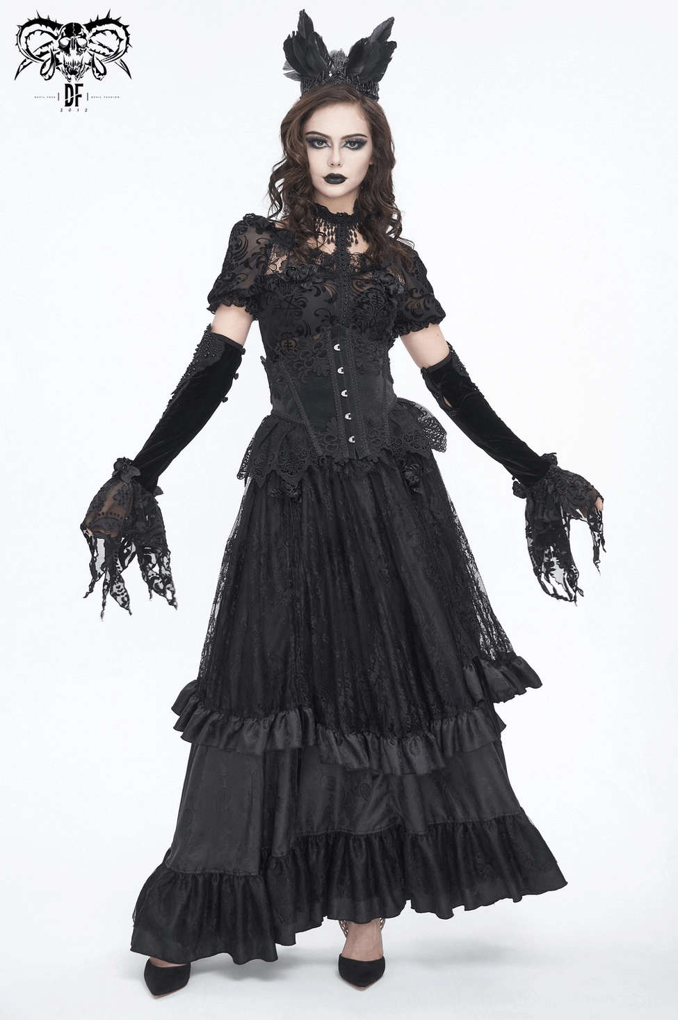 Front facing model shot of black gothic lace underbust corset worn as statement piece with alternative fashion styling