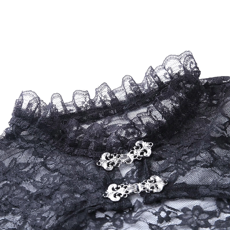 Close-up macro detail of black gothic lace crop top showing ruffled lace collar and ornate metal fasteners