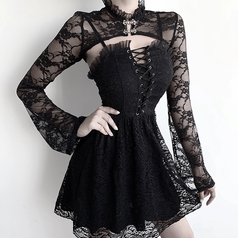 Black gothic lace bolero dress set with flared skirt hem and lace-up front on model, three-quarter side profile