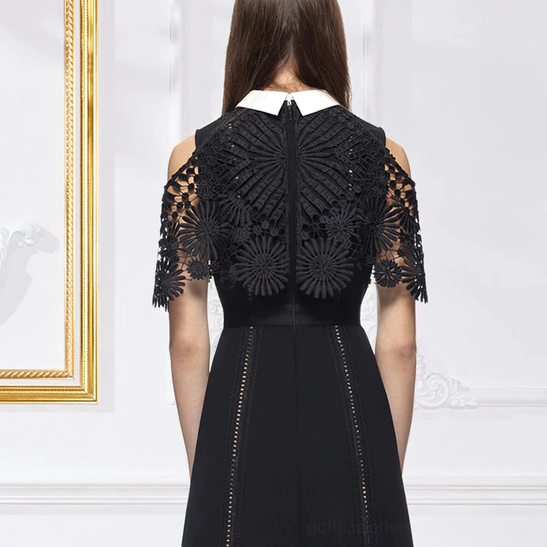 Black gothic hollow-out lace midi dress rear view with laser-cut side trims and white collar detail