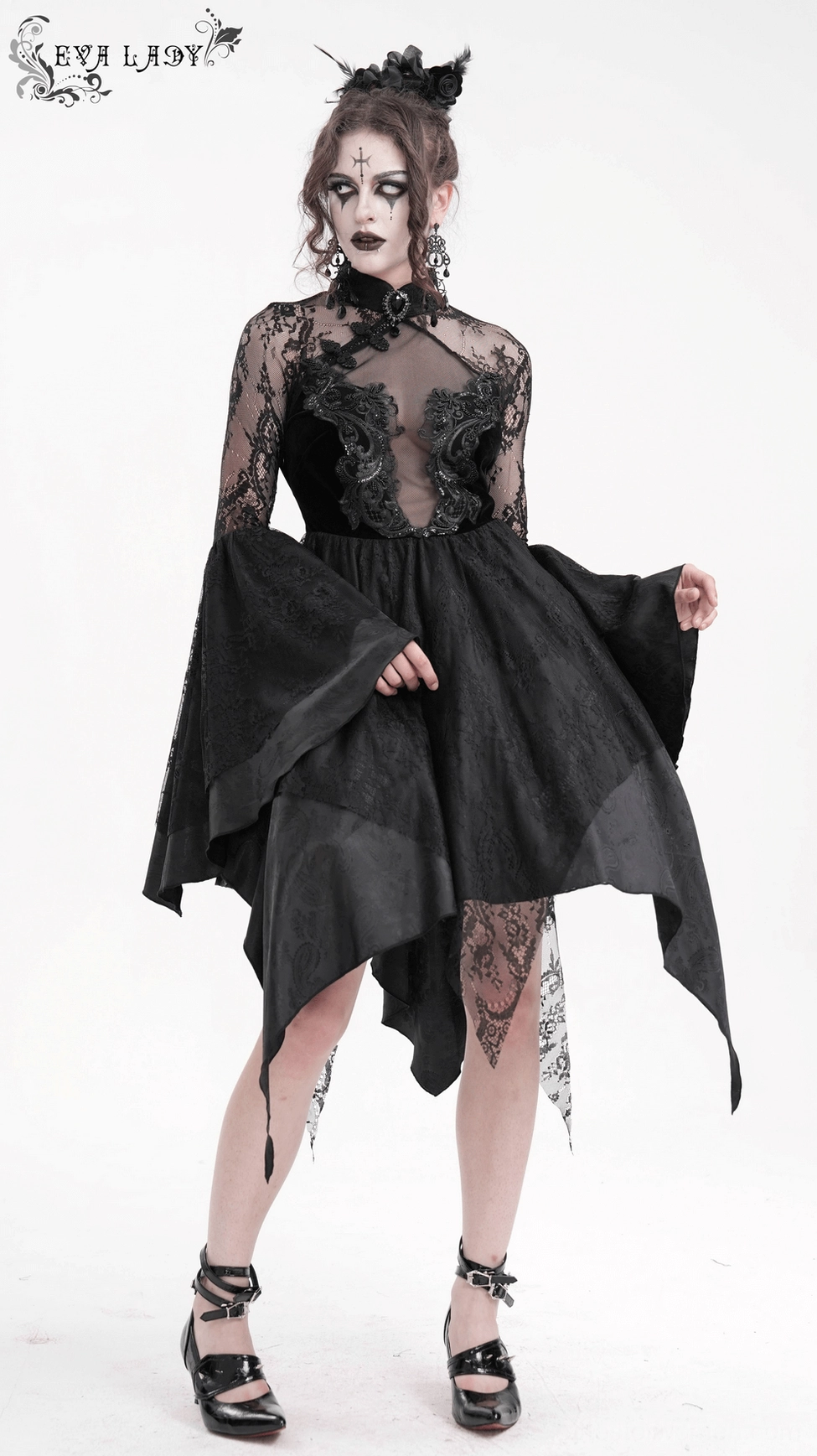 Black gothic lace dress back view highlighting asymmetrical skirt hem and structured corset back panels