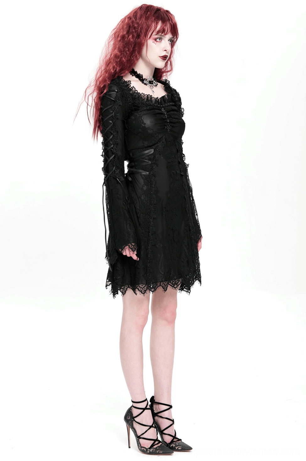 Black gothic lace mini dress flat lay detail showing floral lace and delicate neckline trim