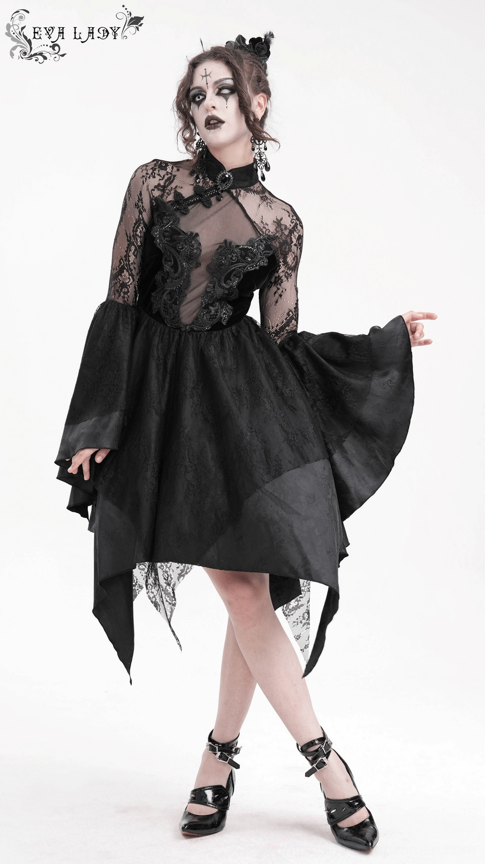 Black gothic lace dress mannequin display from front angle highlighting lace overlay and bell sleeve drama