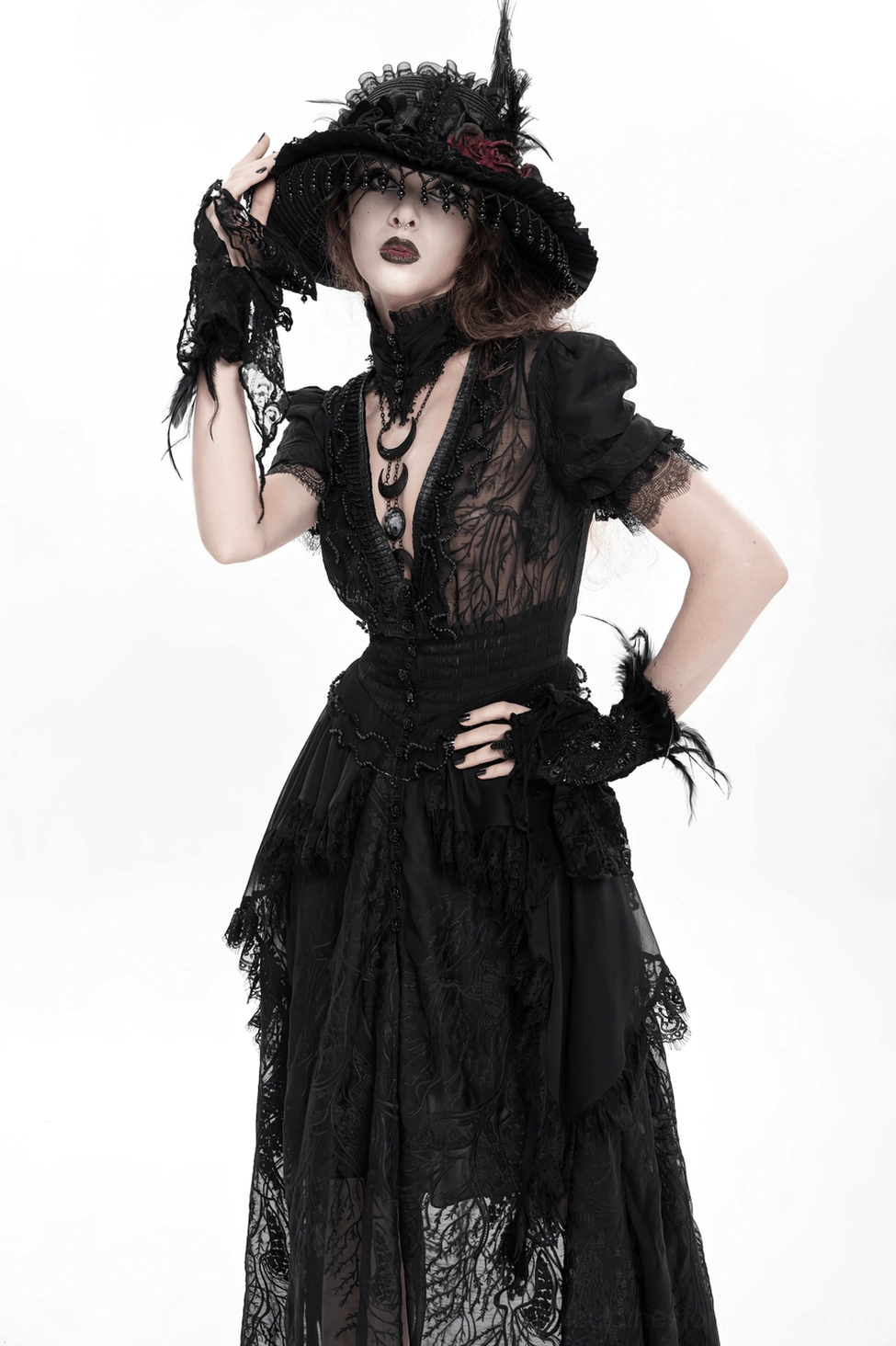 Black gothic lace maxi dress showing puff sleeve detail, fitted arm opening, and upper bodice construction