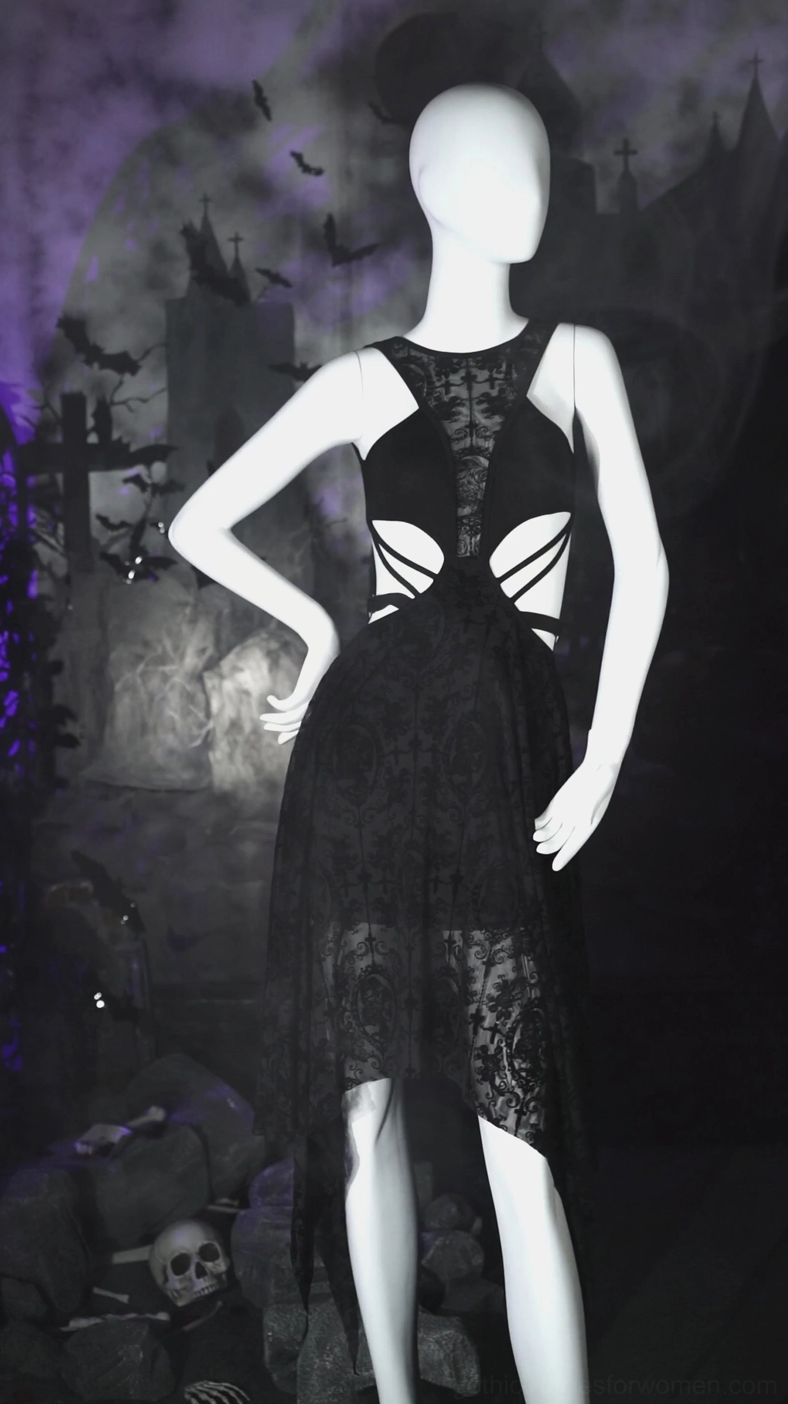 Black gothic lace irregular dress three-quarter view on mannequin with cutout waist details