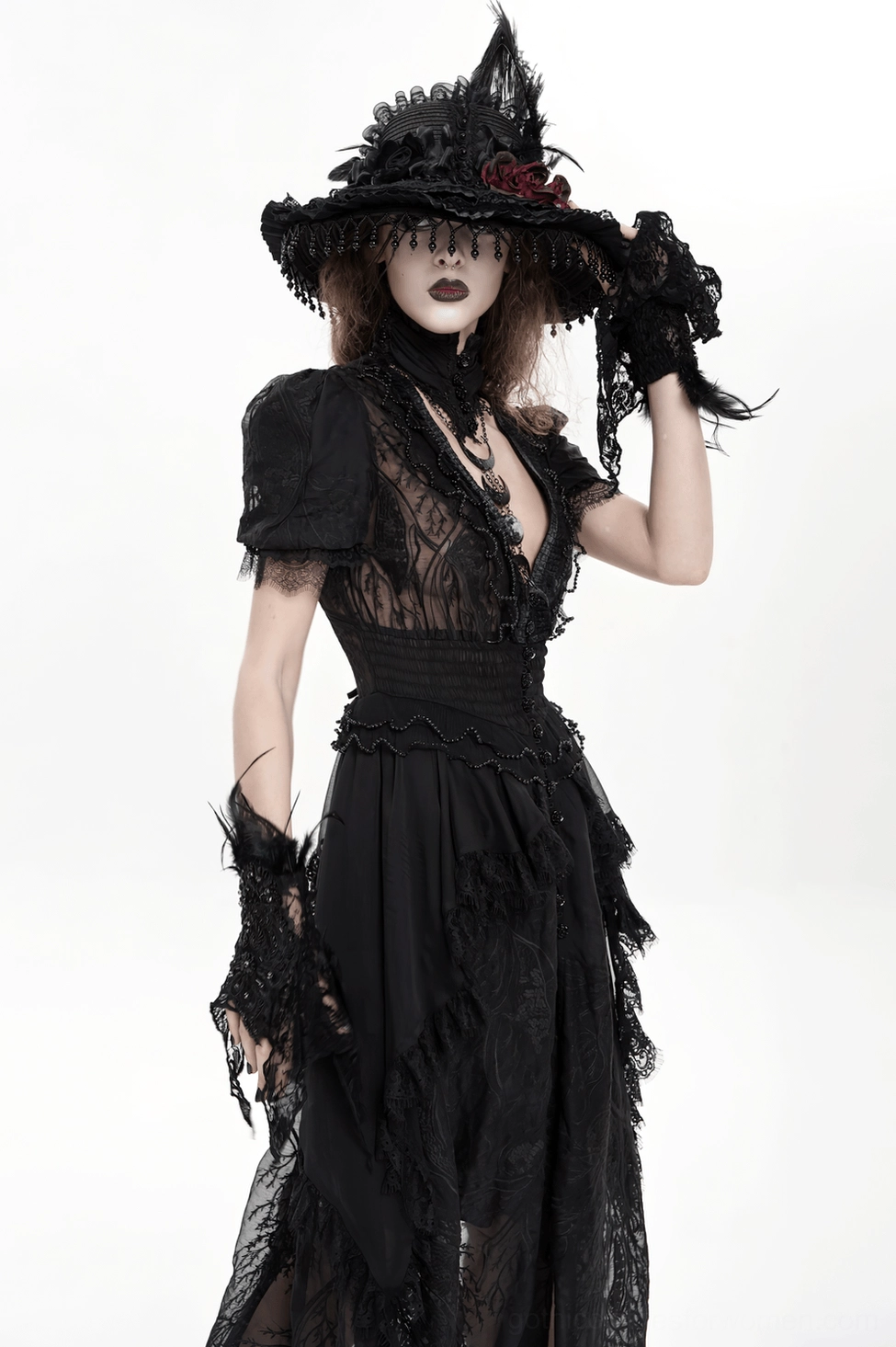 Black gothic lace mesh dress demonstrating skirt volume, cascade of ruffles, and flowing fabric movement