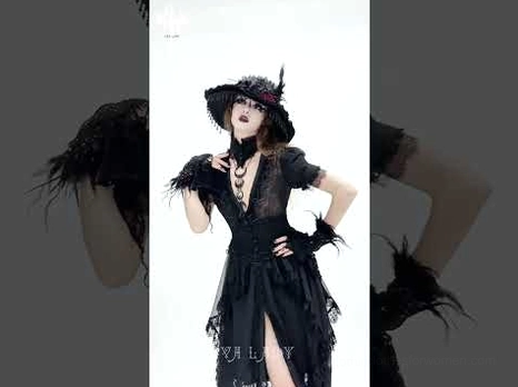 Black gothic lace dress detail shots showing side slit, feathered gloves styling, and ruffled mesh embellishments