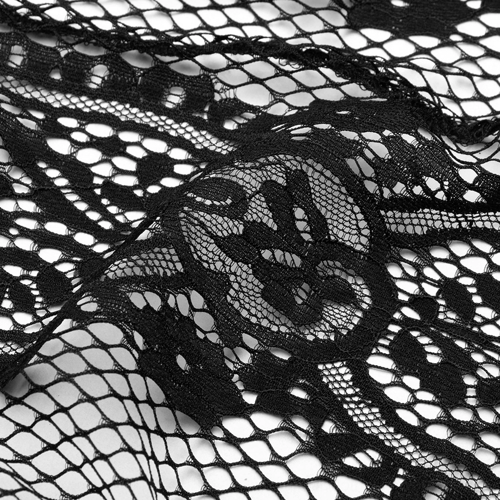 Close-up detail of black gothic lace mesh fabric with intricate floral skull pattern on sheer mesh base