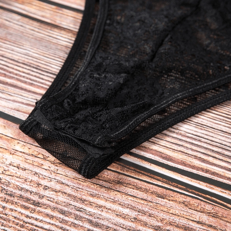 Gothic black lace jumpsuit styling photograph showing full garment silhouette and lace pattern