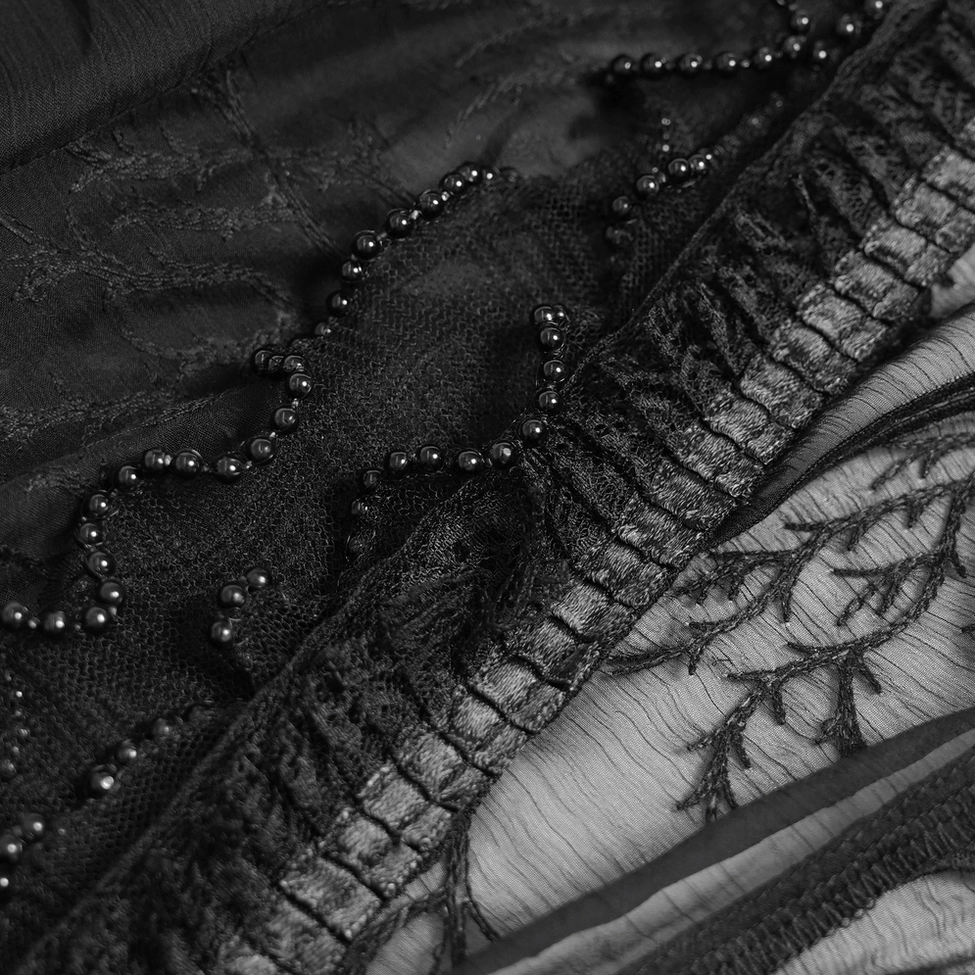Black gothic lace maxi dress full-body front view displaying V-neck, puff sleeves, and dramatic ruffled skirt silhouette