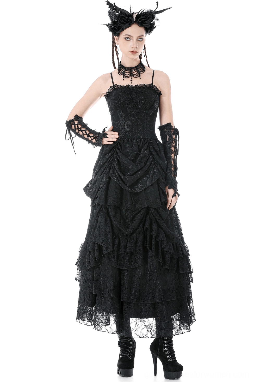 Black gothic lace maxi dress with ruched tiered skirt, modeled from front with spaghetti straps and form-fitting lace bodice